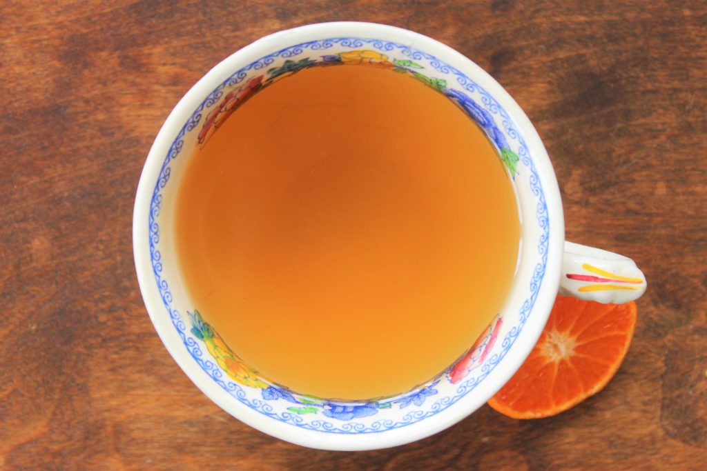orange and fennel tea in a vintage tea cup