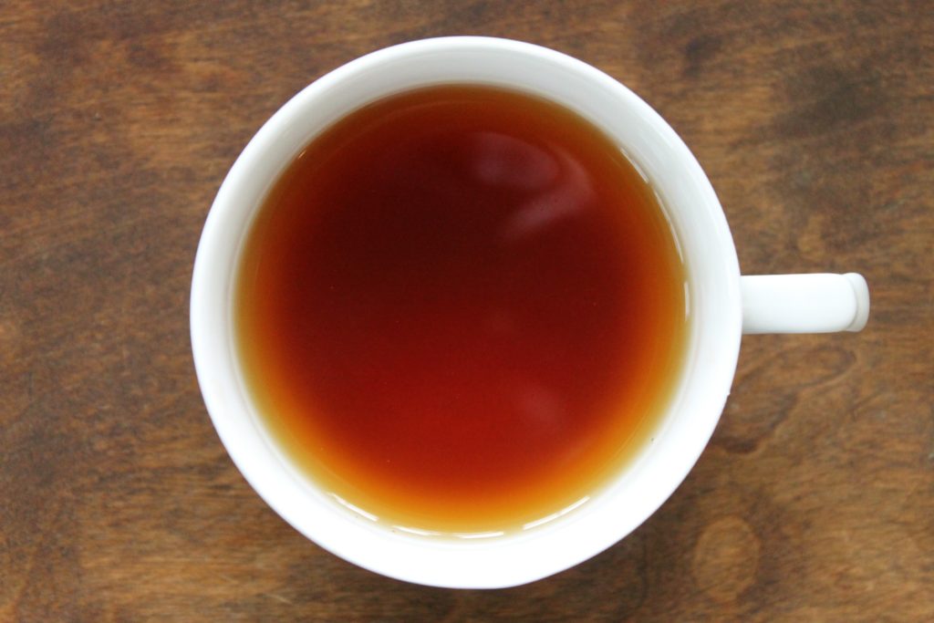 earl grey tea in white teacup