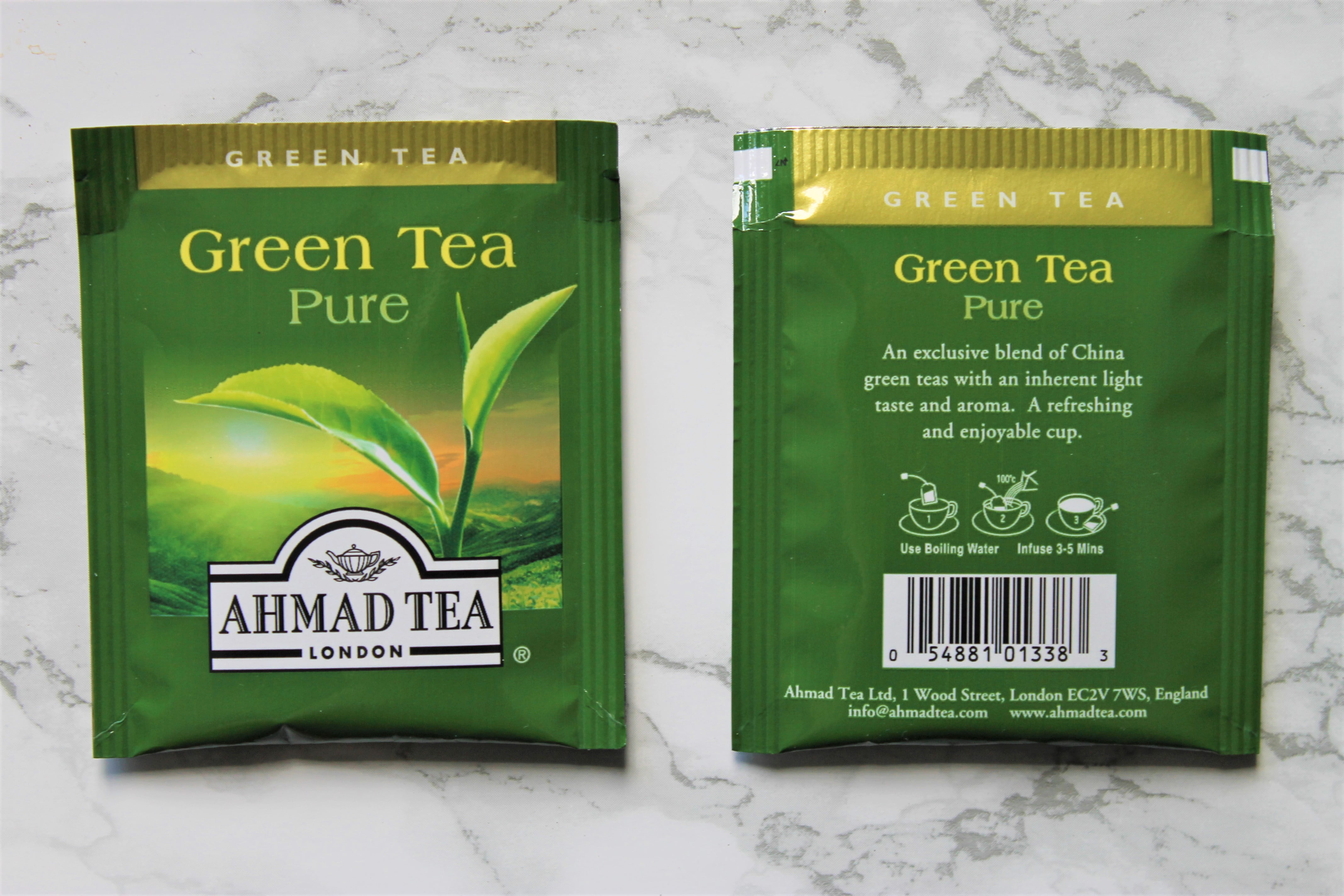 Yadah green tea pure. Gunpowder Green Tea Ahmad Tea. Ахмад зеленый чай Gunpowder. Green Tea реплики. 312 - Зеленый чай.