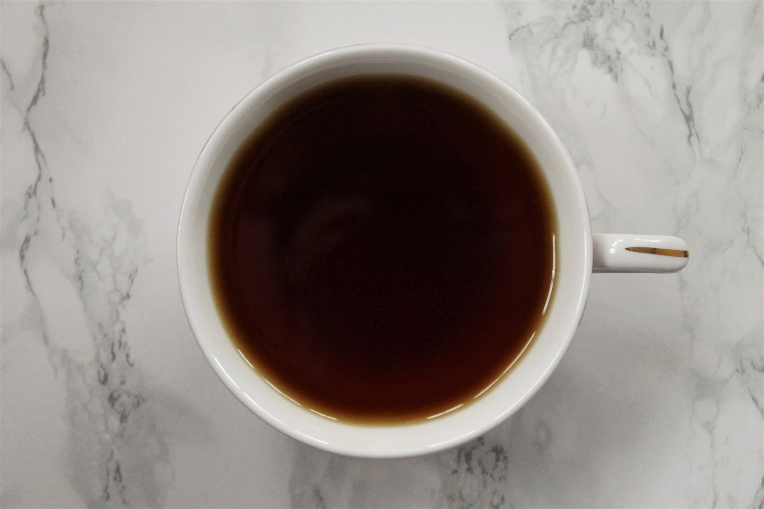 mlesna ceylon black tea in teacup from above