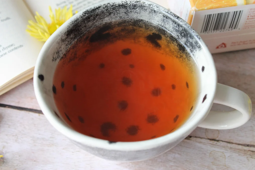 cup of twinings peach and orange herbal tea